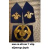 baret embleem aan/afvoer